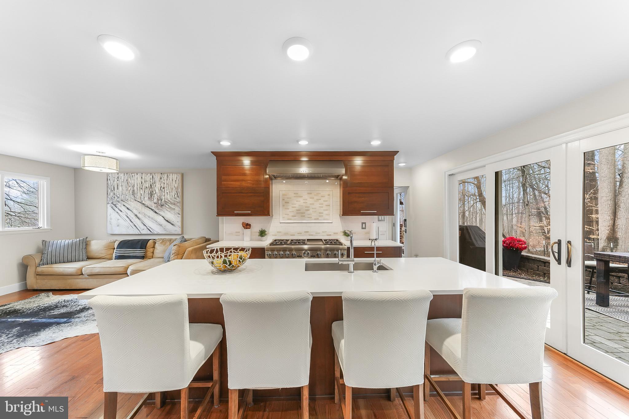 535 Webb Road Chadds Ford, PA 19317 - Photo 12 of 49 a view of a dining room with furniture and wooden floor