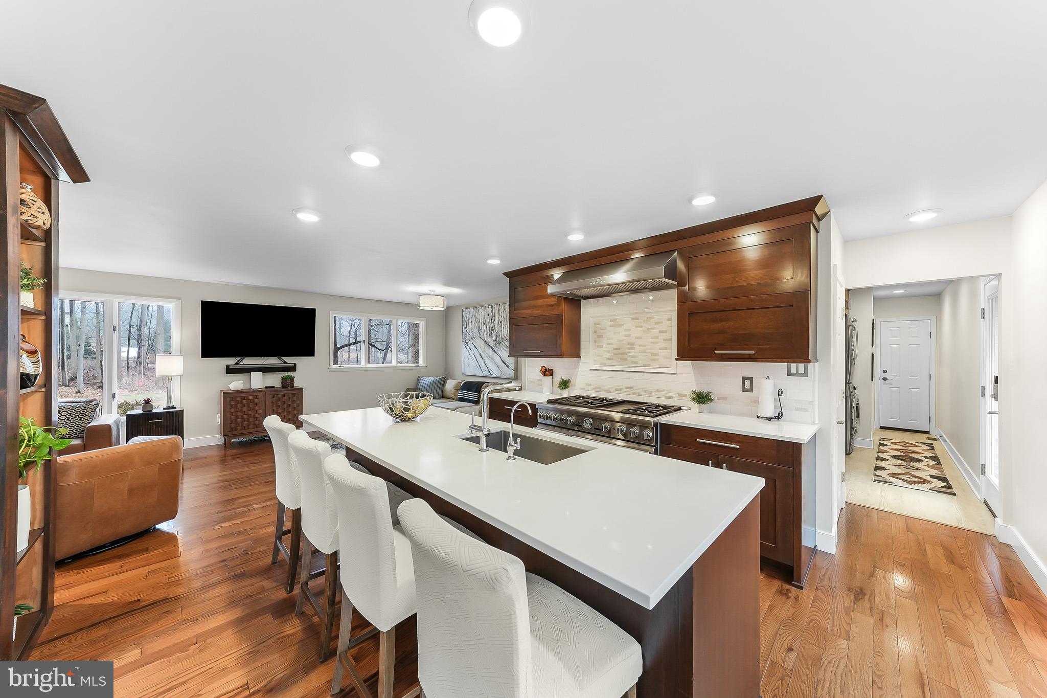 535 Webb Road Chadds Ford, PA 19317 - Photo 13 of 49 a view of a dining room with furniture a rug and wooden floor