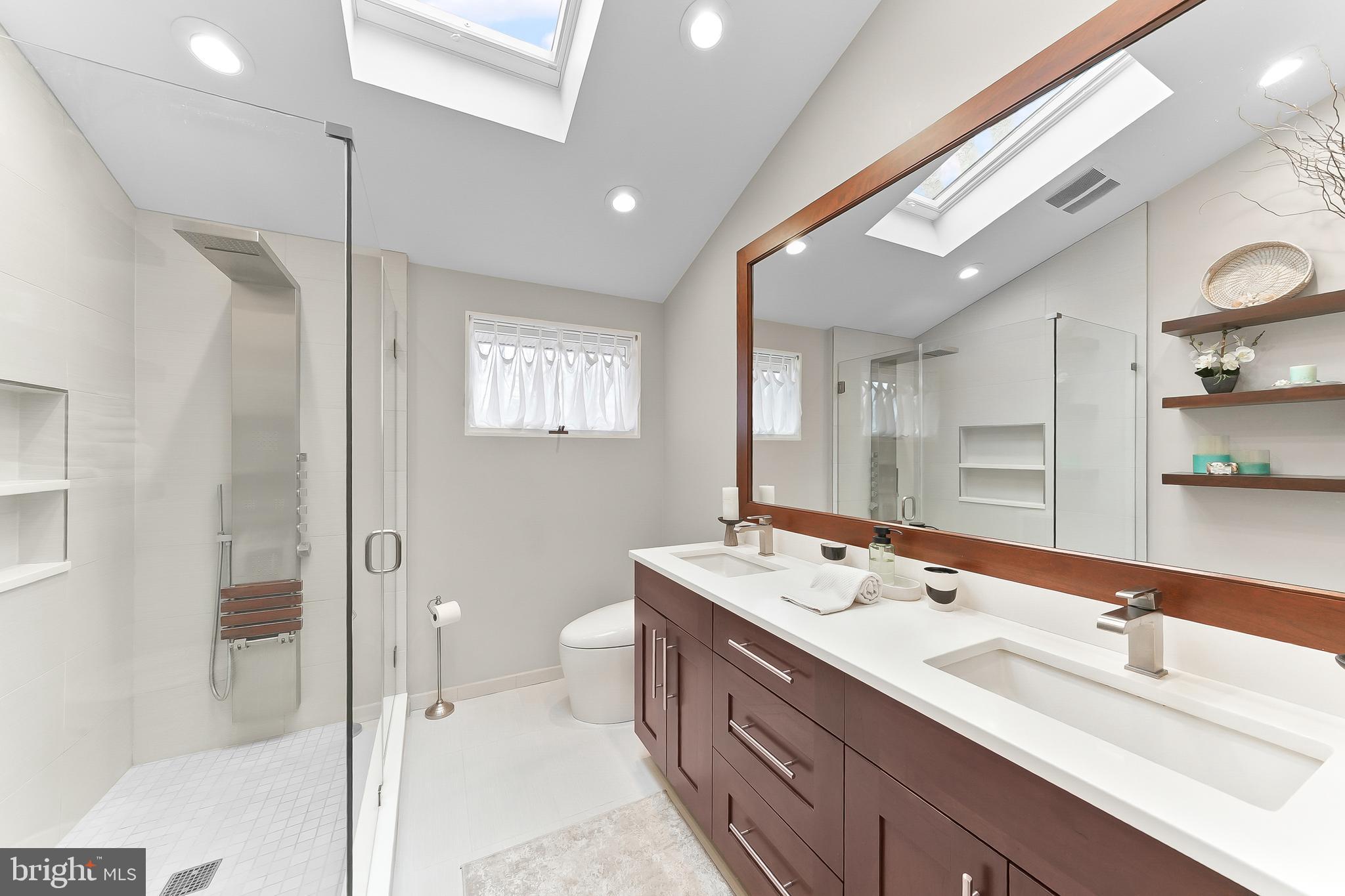 535 Webb Road Chadds Ford, PA 19317 - Photo 25 of 49 a bathroom with a double vanity sink mirror and double