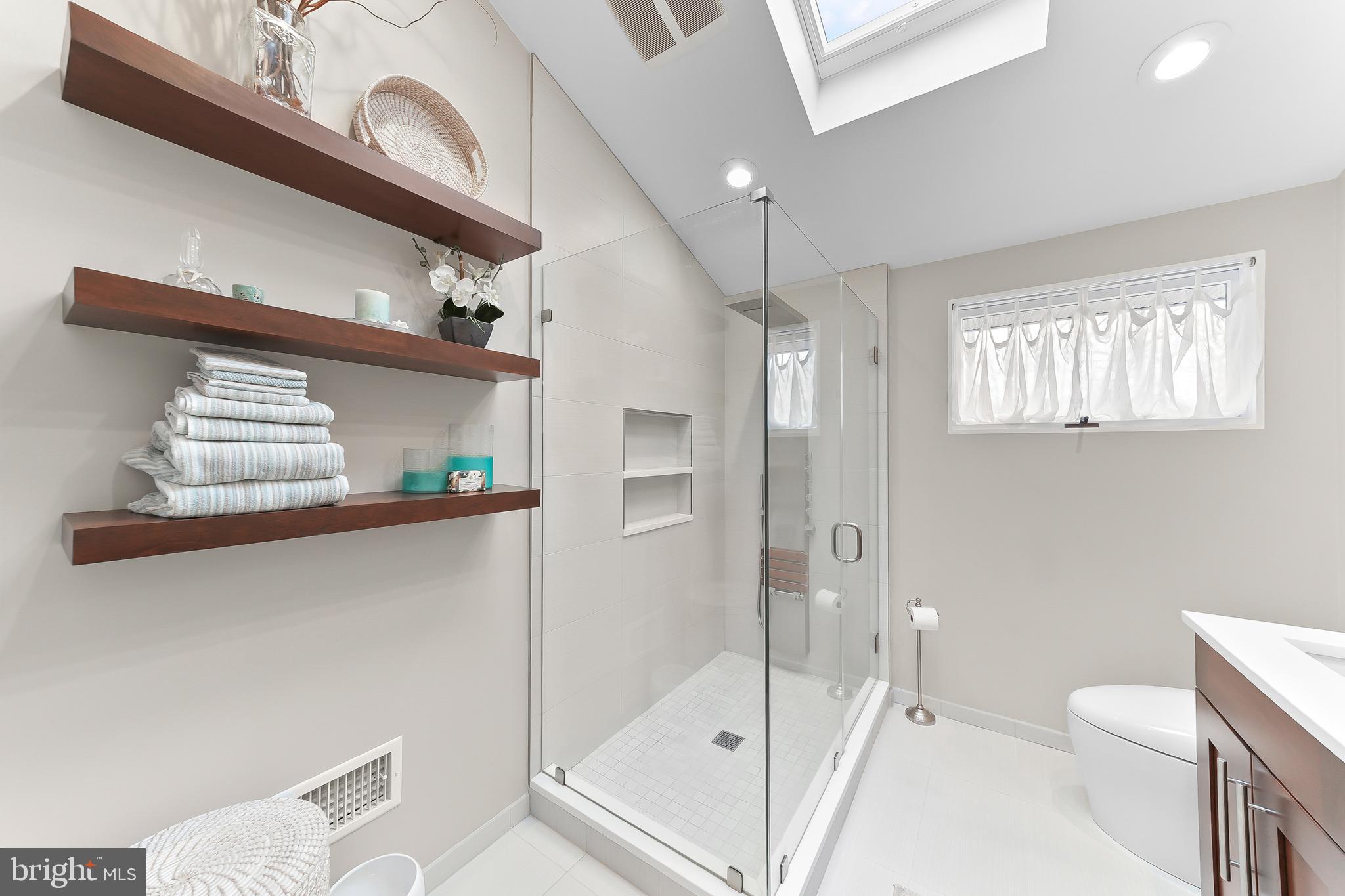 535 Webb Road Chadds Ford, PA 19317 - Photo 26 of 49 a bathroom with a sink a toilet and shower