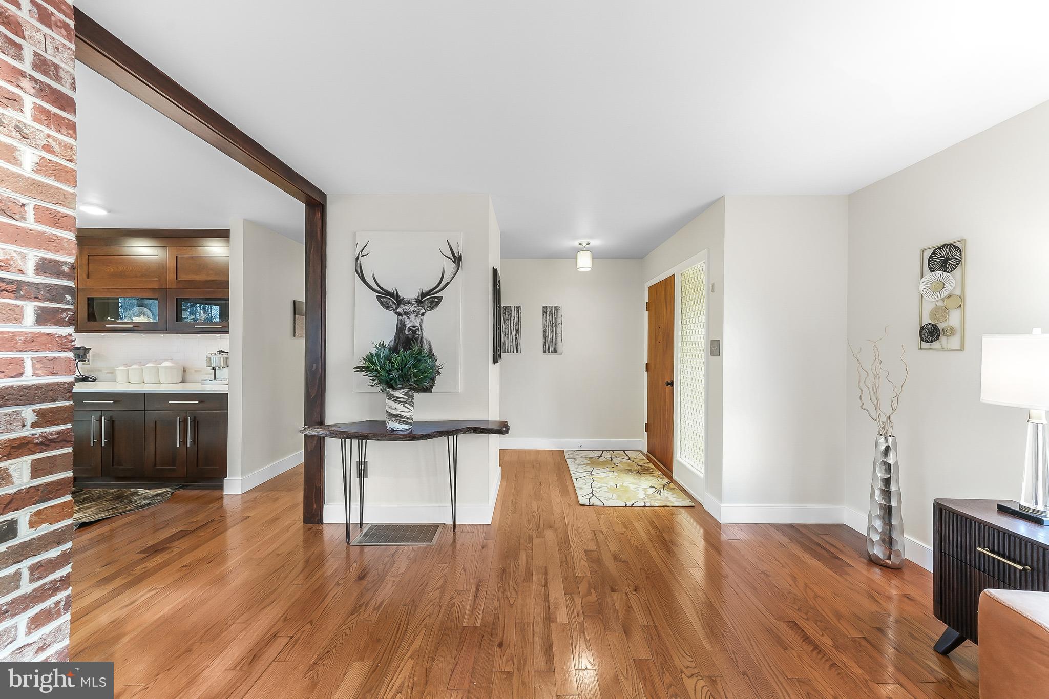 535 Webb Road Chadds Ford, PA 19317 - Photo 3 of 49 a view of a living room kitchen and a wooden floor