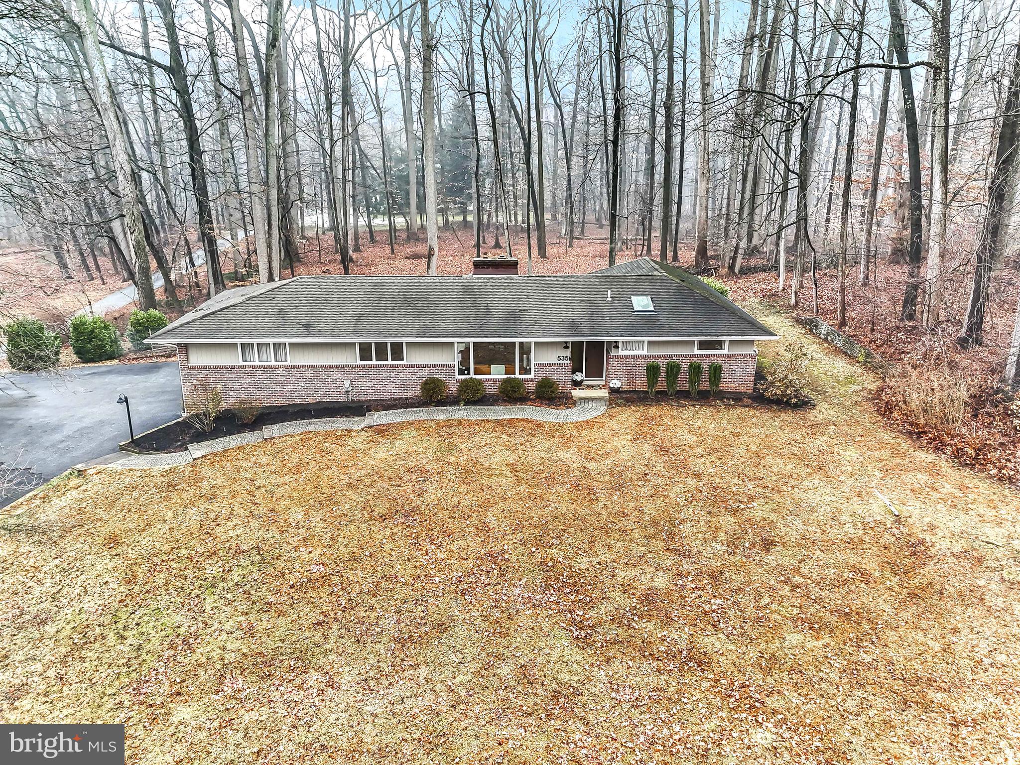 535 Webb Road Chadds Ford, PA 19317 - Photo 39 of 49 a view of outdoor space with swimming pool and trees