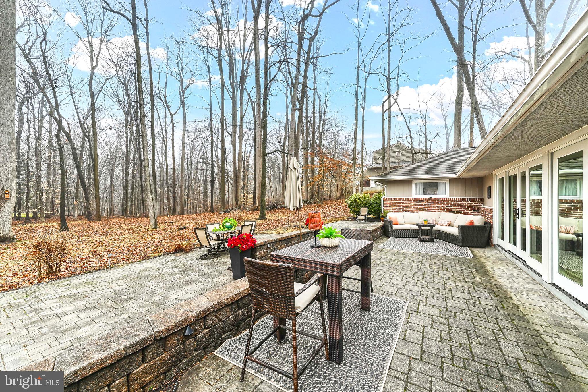 535 Webb Road Chadds Ford, PA 19317 - Photo 40 of 49 a view of a dinning table and chair in the patio