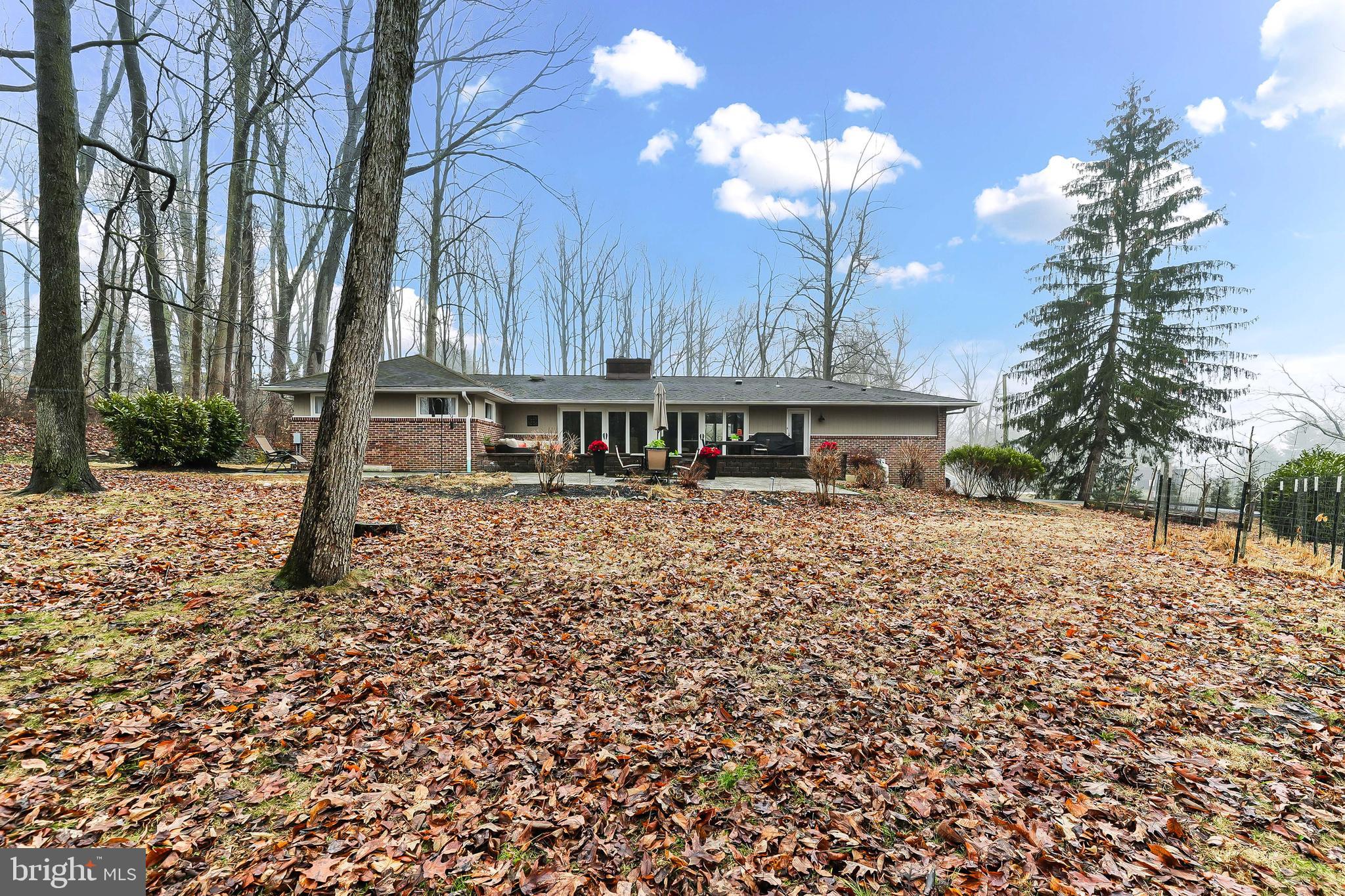 535 Webb Road Chadds Ford, PA 19317 - Photo 41 of 49 a front view of a house with a yard