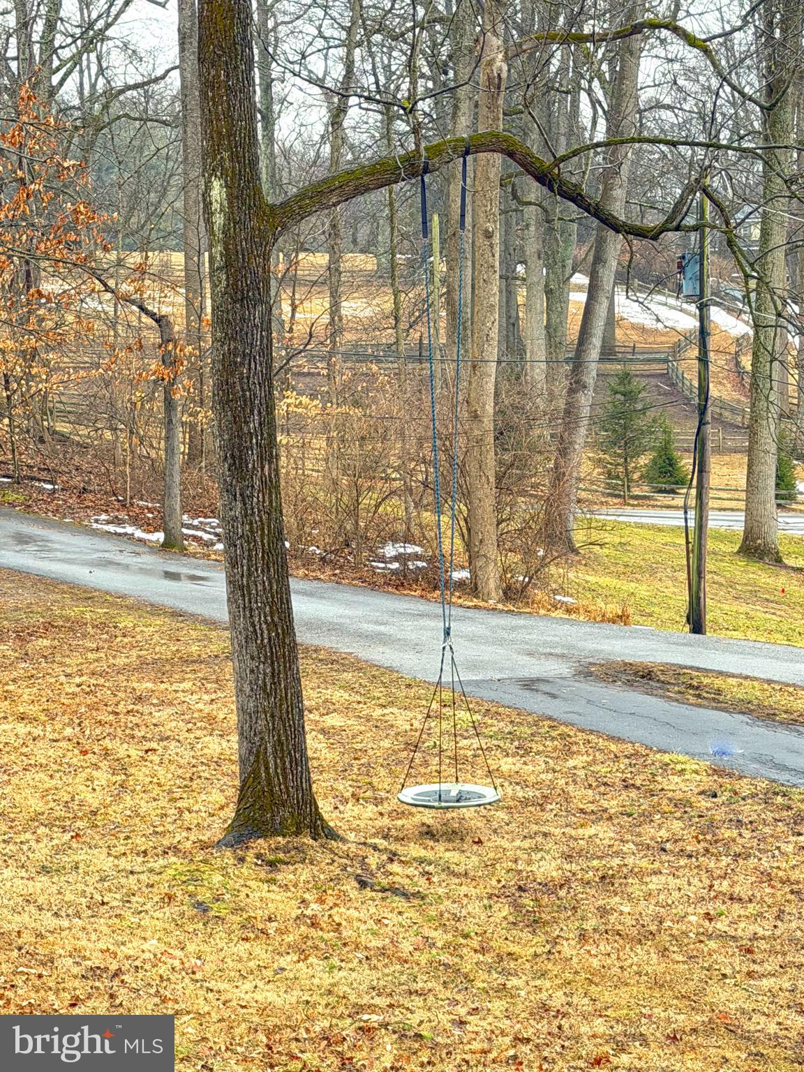 535 Webb Road Chadds Ford, PA 19317 - Photo 49 of 49 a view of a swimming pool with an outdoor space and seating area