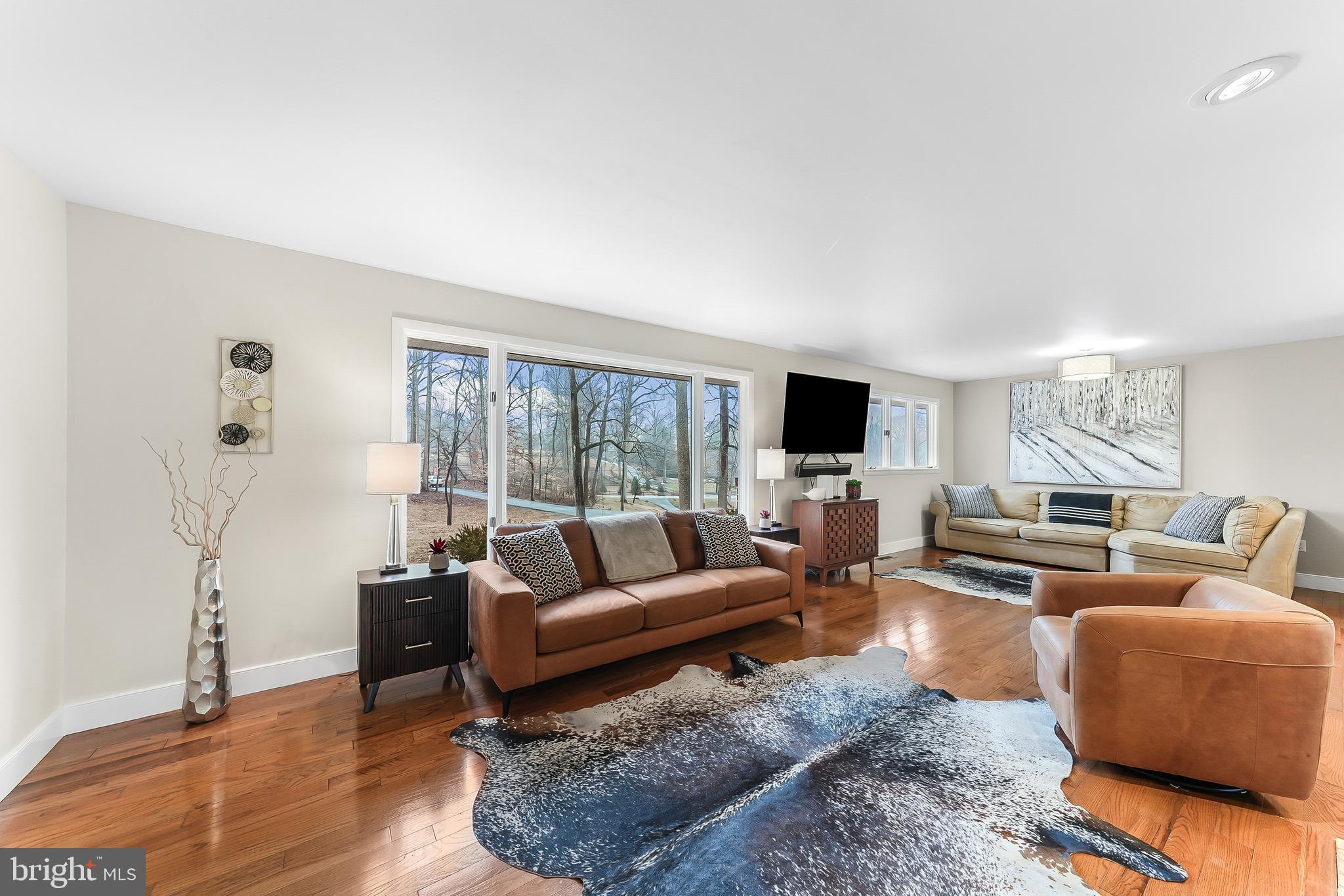 535 Webb Road Chadds Ford, PA 19317 - Photo 6 of 49 a living room with furniture and a flat screen tv