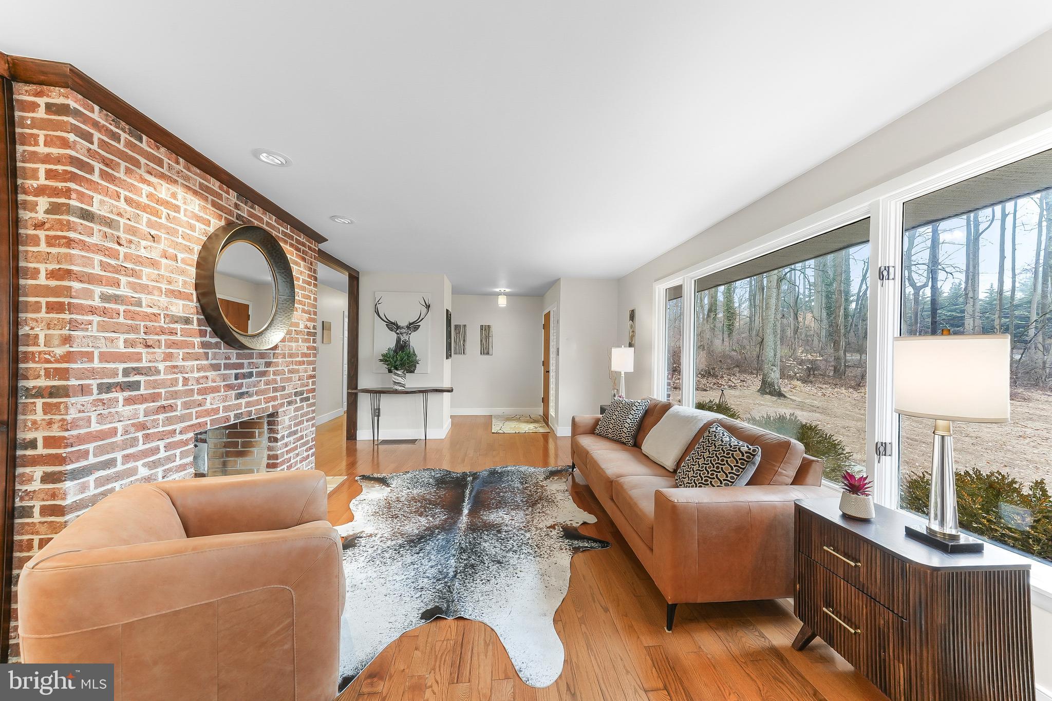 535 Webb Road Chadds Ford, PA 19317 - Photo 9 of 49 a living room with furniture and a large window