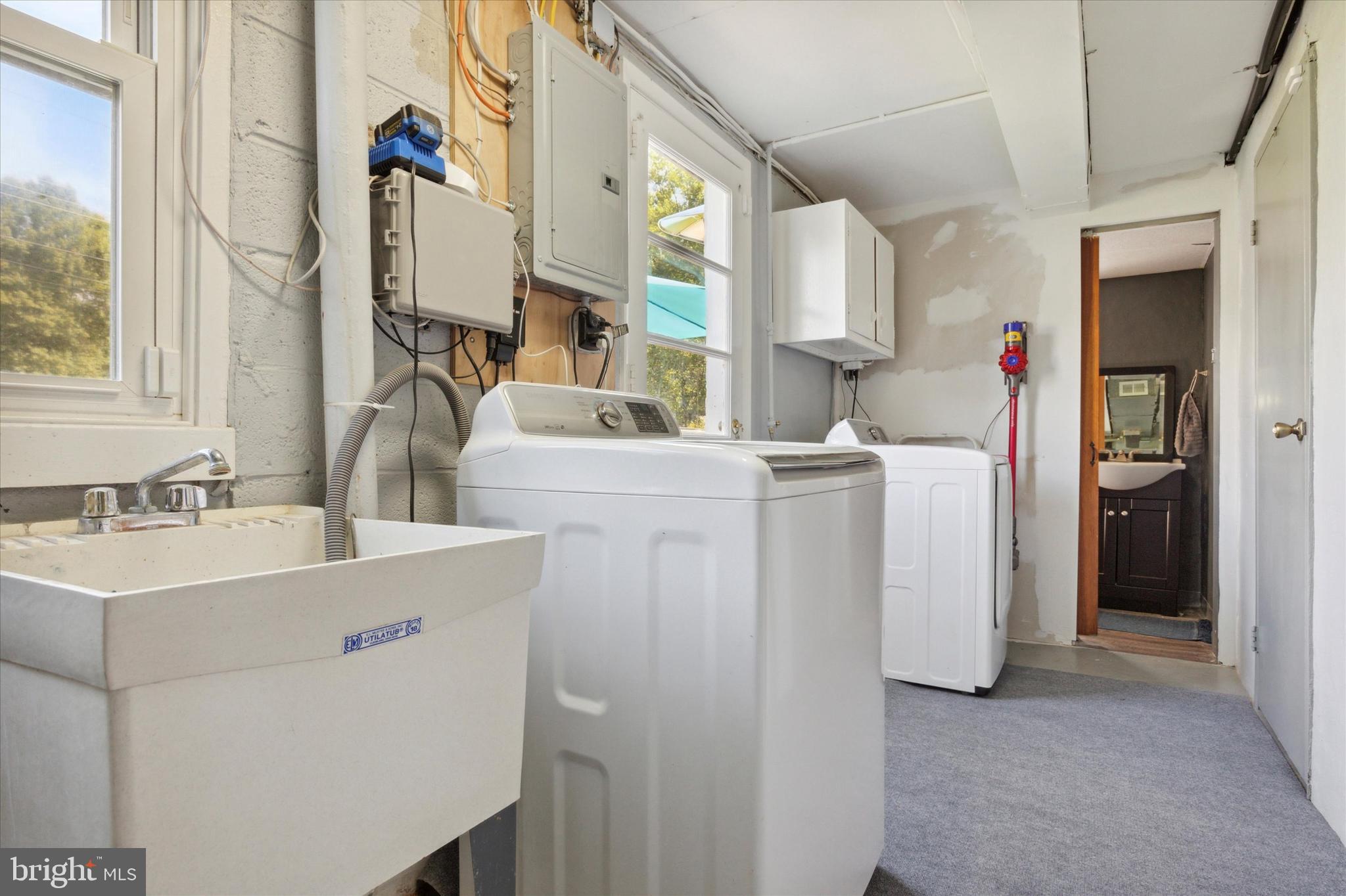 3121 Shirlene Road Norristown, PA 19403 - Photo 29 of 35 Lower Level Laundry w/ Walk-Out to Backyard