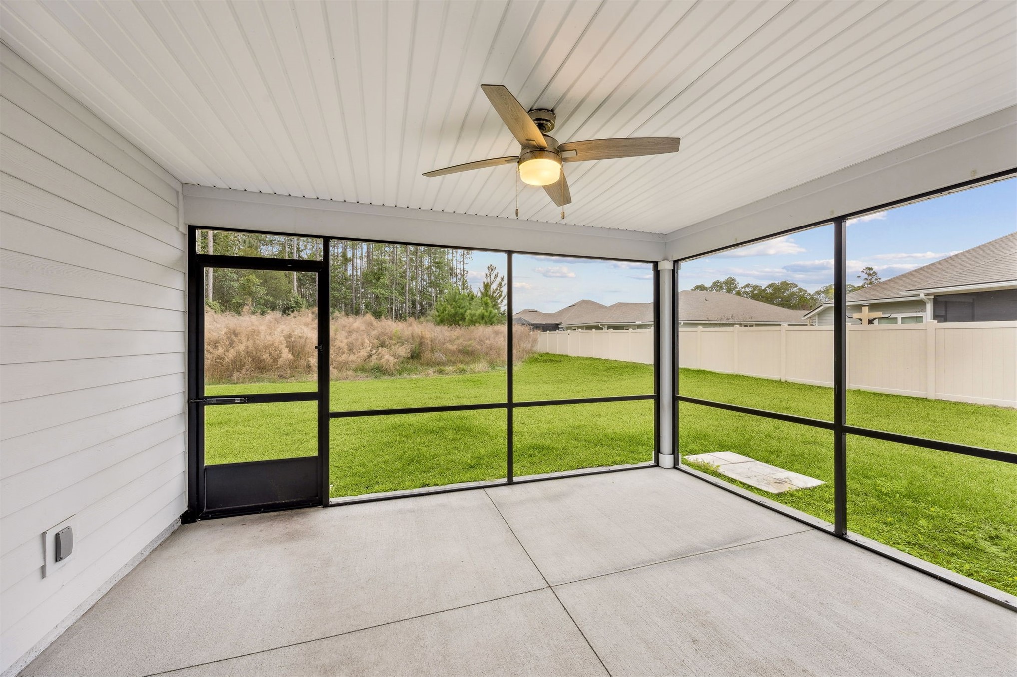 96735 Quartz Lane Yulee, FL 32097 - Photo 14 of 61 Screened lanai