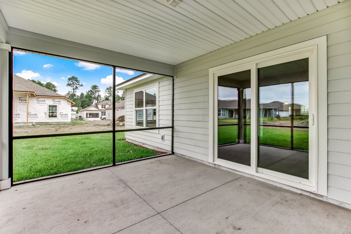 96735 Quartz Lane Yulee, FL 32097 - Photo 19 of 66 screened patio- enter to family room