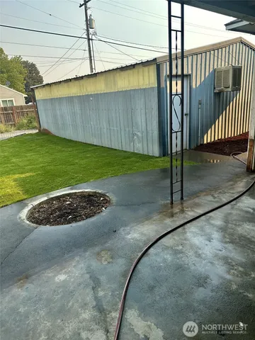 a view of a backyard with porch