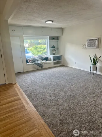 a view of an empty room and window