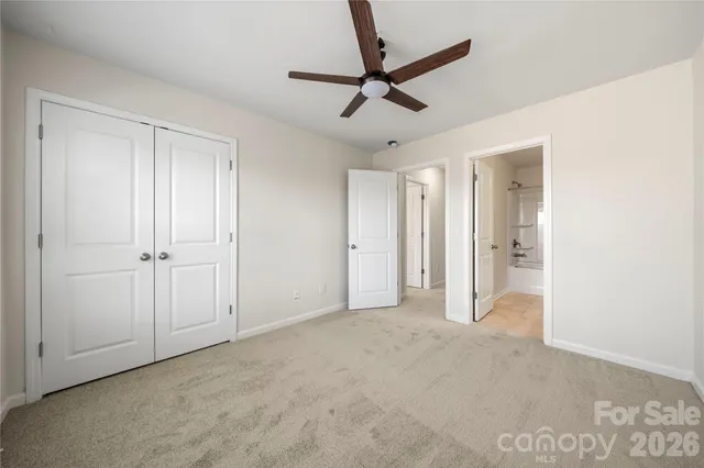 a view of a livingroom with a ceiling fan