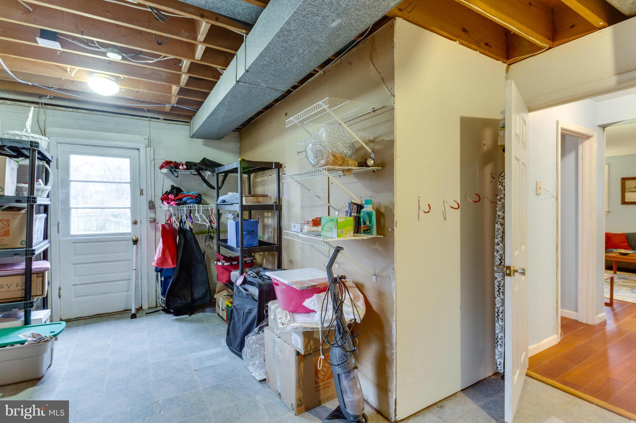 9810 Vale Road Vienna, VA 22181 - Photo 21 of 30 Unfinished Storage Room opens to side yard