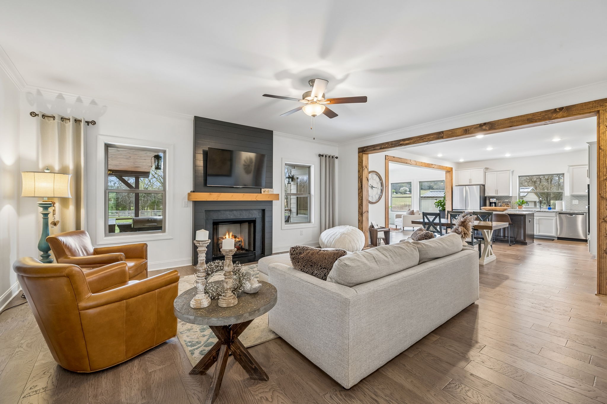 12745 North Milton Road Milton, TN 37118 - Photo 11 of 57 a living room with furniture a fireplace and a flat screen tv