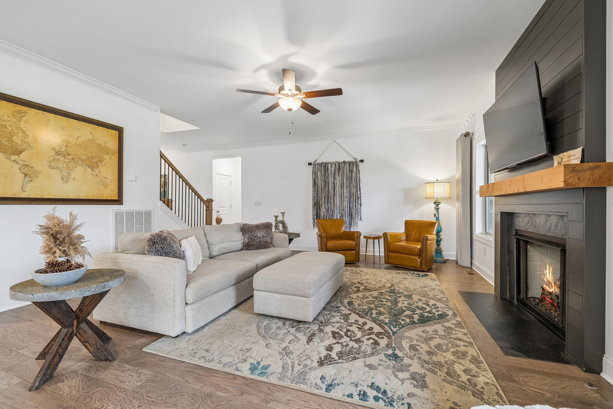 12745 North Milton Road Milton, TN 37118 - Photo 14 of 57 a living room with furniture a flat screen tv and a fireplace