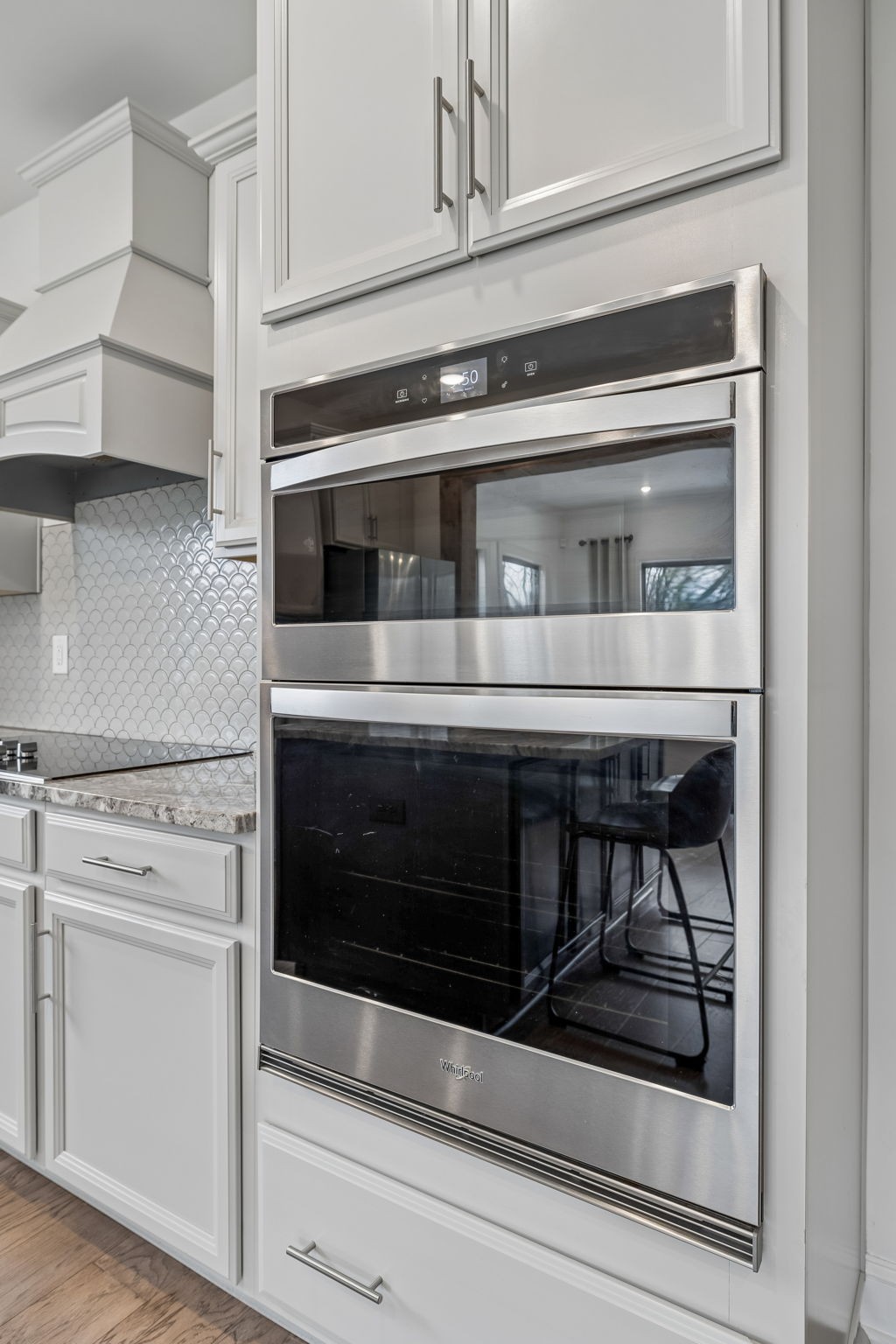 12745 North Milton Road Milton, TN 37118 - Photo 19 of 57 a stove top oven sitting inside of a kitchen and stainless steel appliances