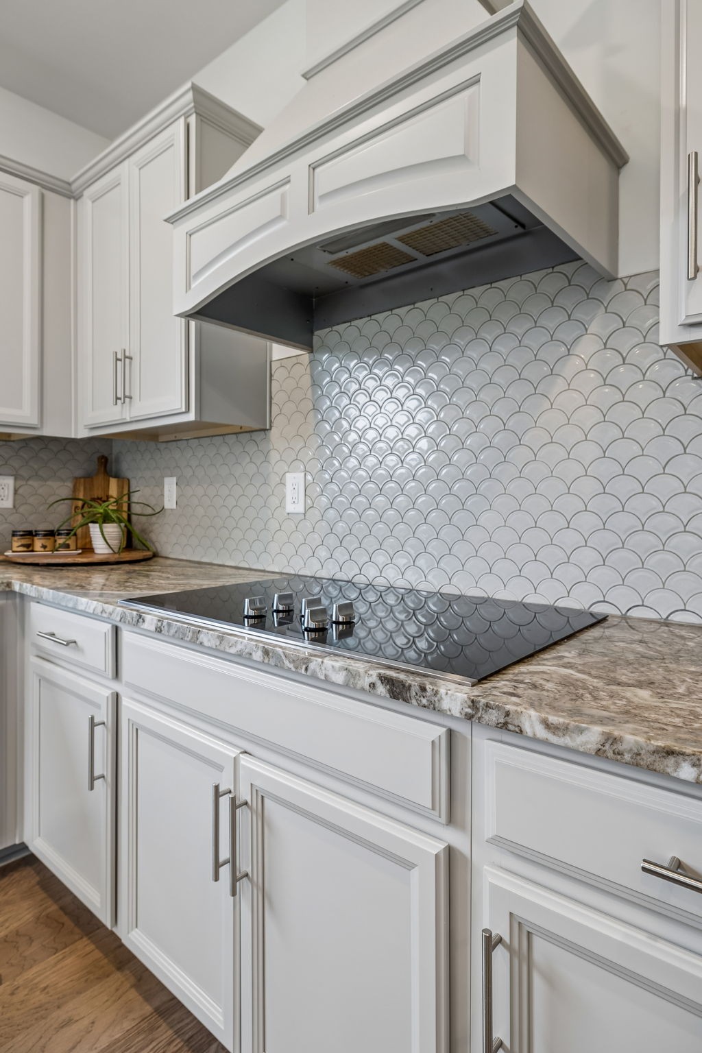 12745 North Milton Road Milton, TN 37118 - Photo 20 of 57 a kitchen with granite countertop white cabinets and white appliances