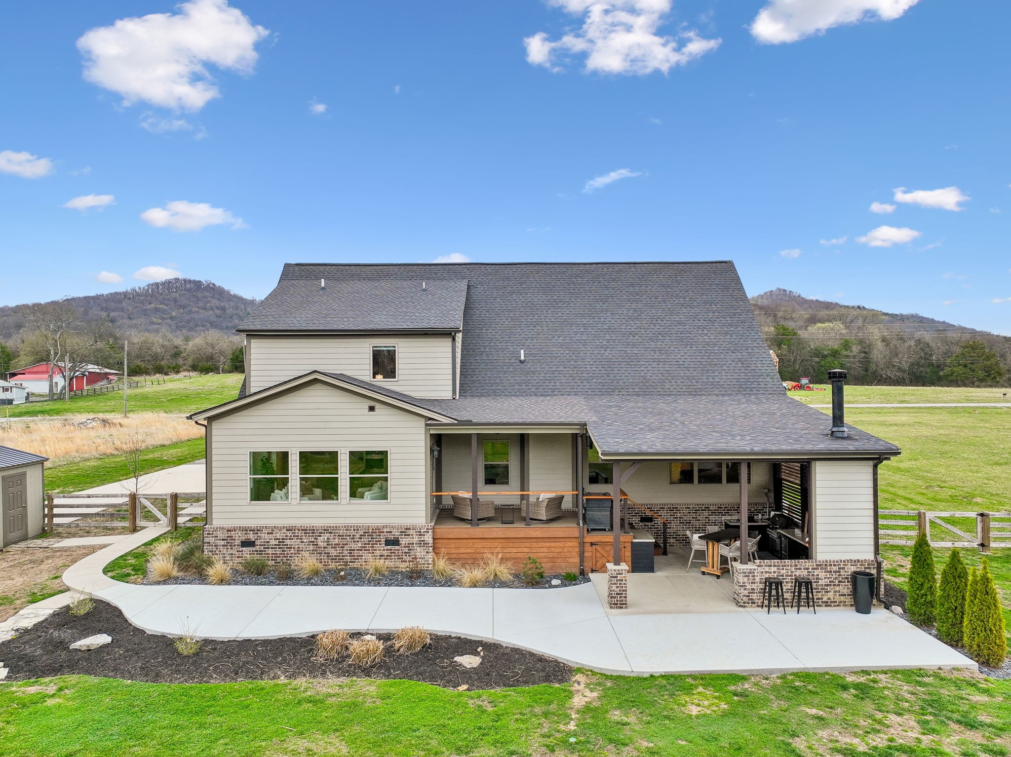 12745 North Milton Road Milton, TN 37118 - Photo 2 of 57 a front view of a house with a yard