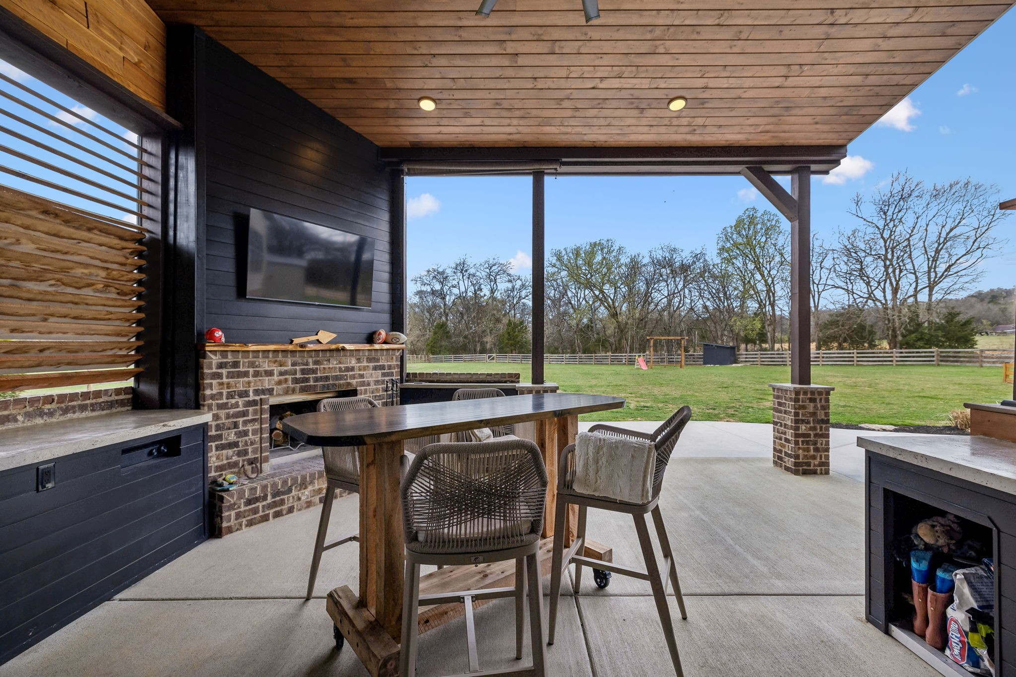 12745 North Milton Road Milton, TN 37118 - Photo 28 of 57 a patio with a table chairs and a barbeque