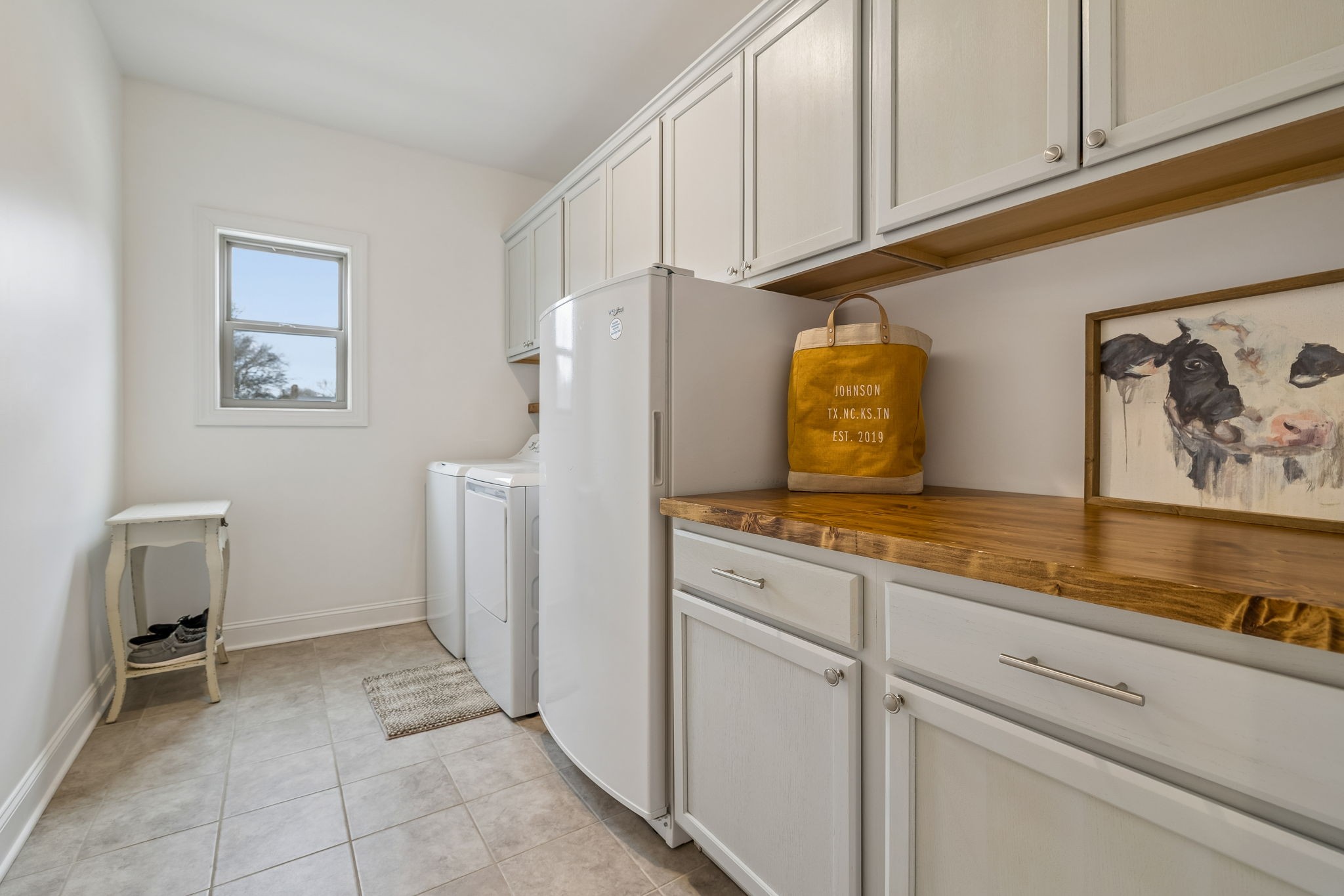 12745 North Milton Road Milton, TN 37118 - Photo 32 of 57 a kitchen with stainless steel appliances a refrigerator and cabinets