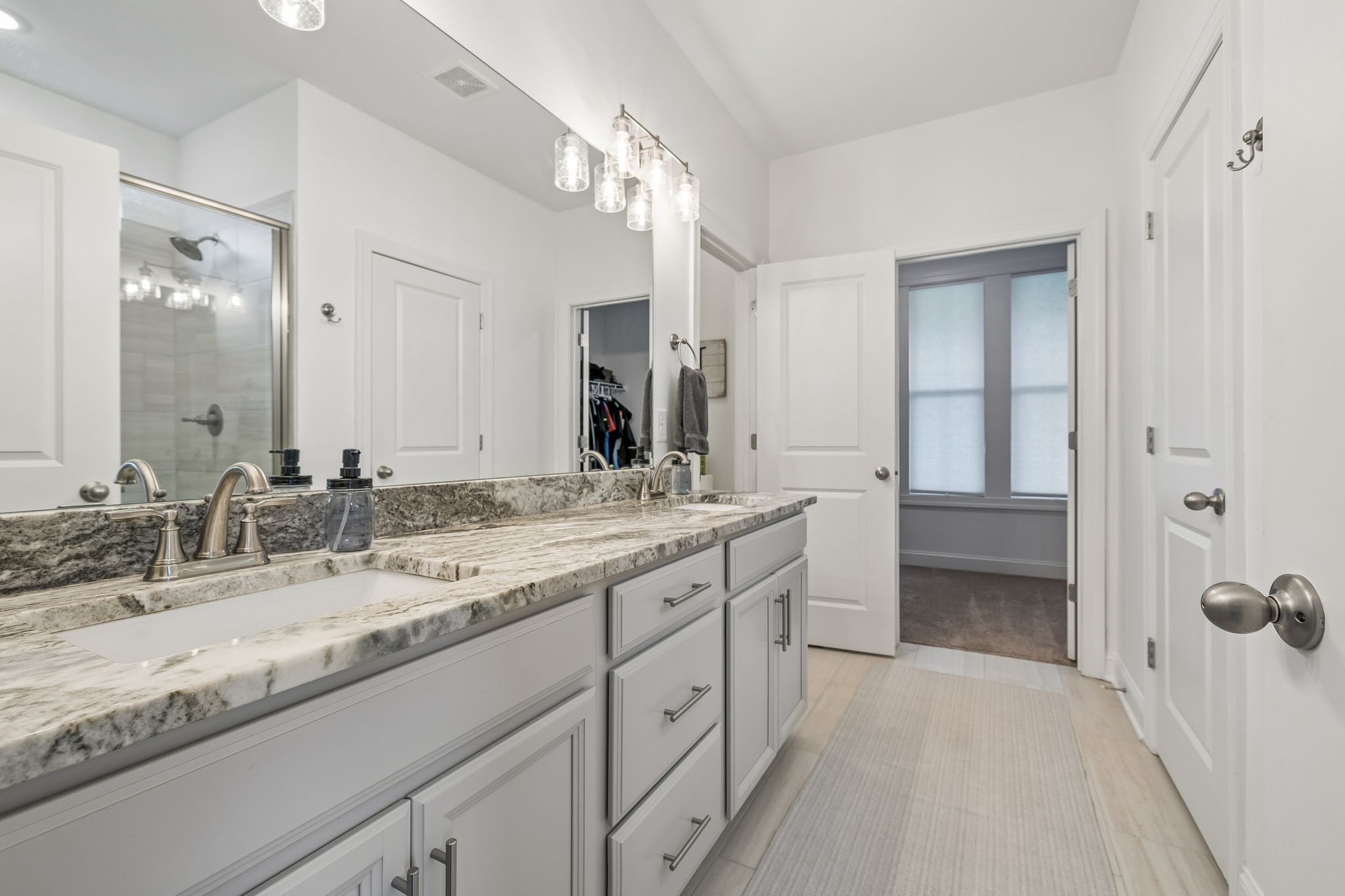 12745 North Milton Road Milton, TN 37118 - Photo 36 of 57 a bathroom with a granite countertop sink double and mirror