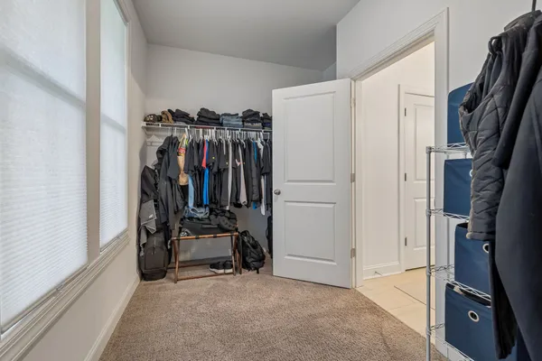 a room with gym equipment and a table