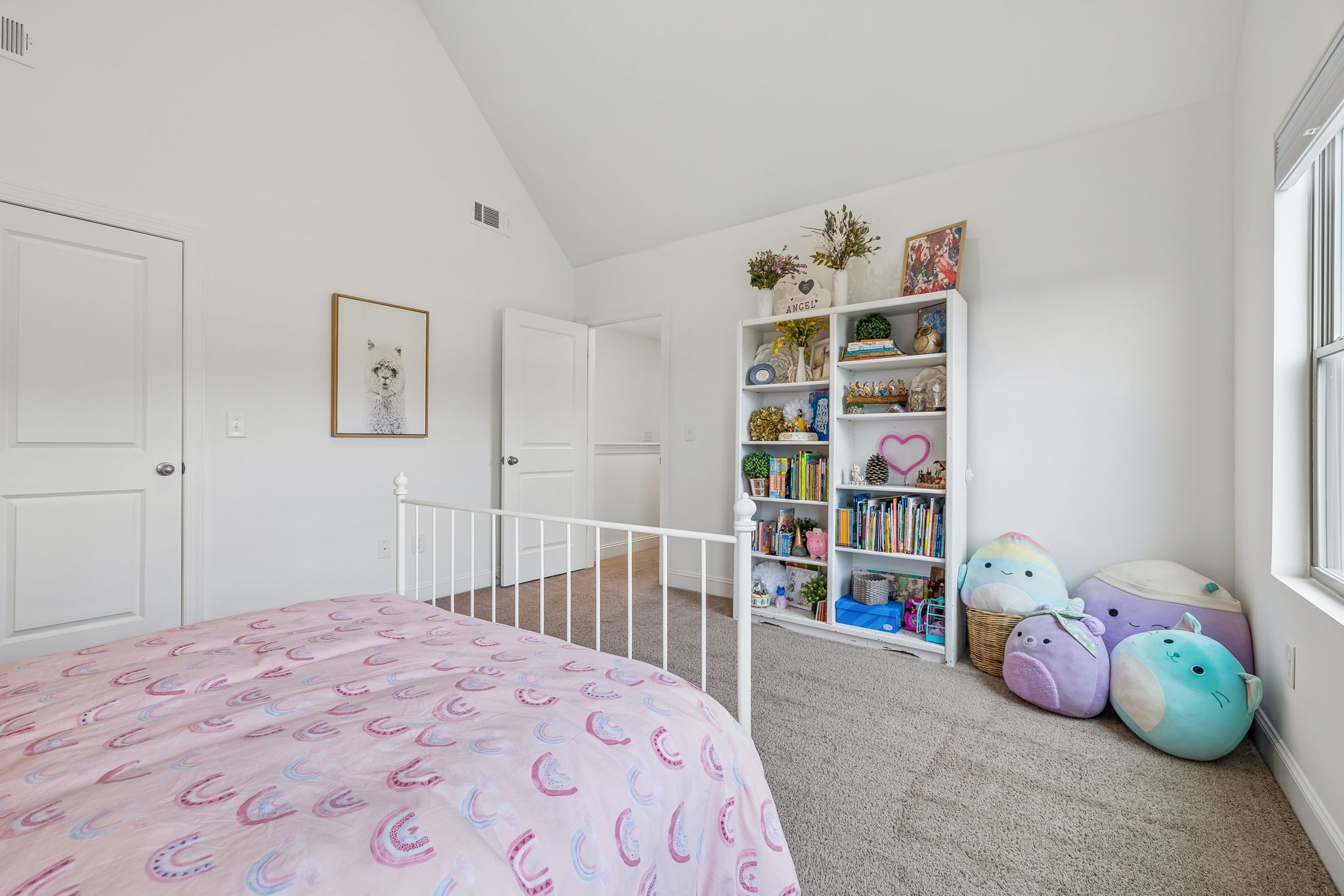 12745 North Milton Road Milton, TN 37118 - Photo 43 of 57 a bedroom with a bed and a book shelf