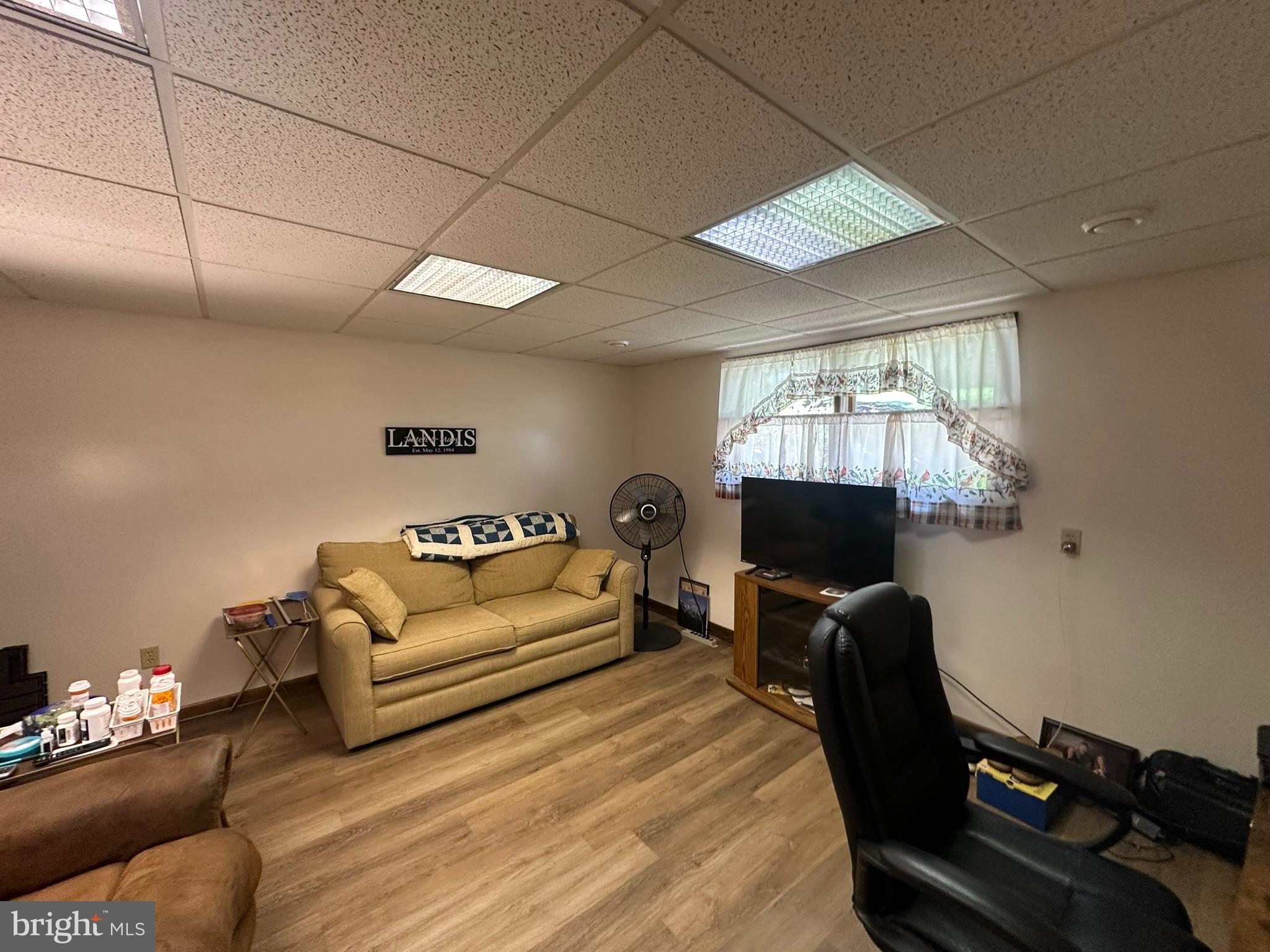 4829 Lehman Road Spring Grove, PA 17362 - Photo 25 of 42 a living room with furniture and a flat screen tv