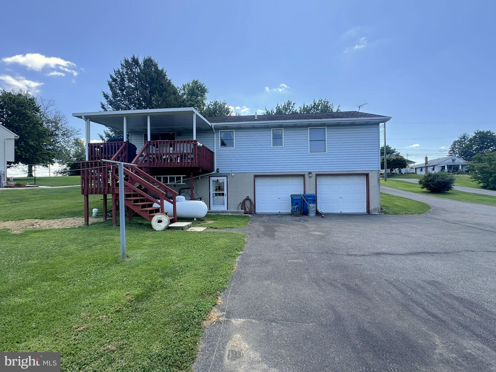 4829 Lehman Road Spring Grove, PA 17362 - Photo 35 of 42 a view of a house with a yard and sitting area