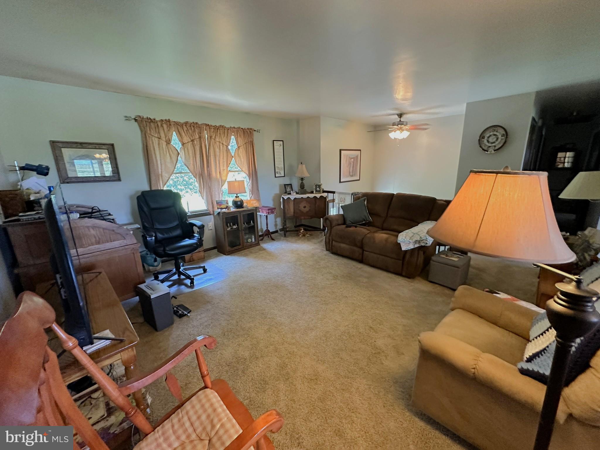 4829 Lehman Road Spring Grove, PA 17362 - Photo 7 of 42 a living room with furniture a air conditioner vent and a window