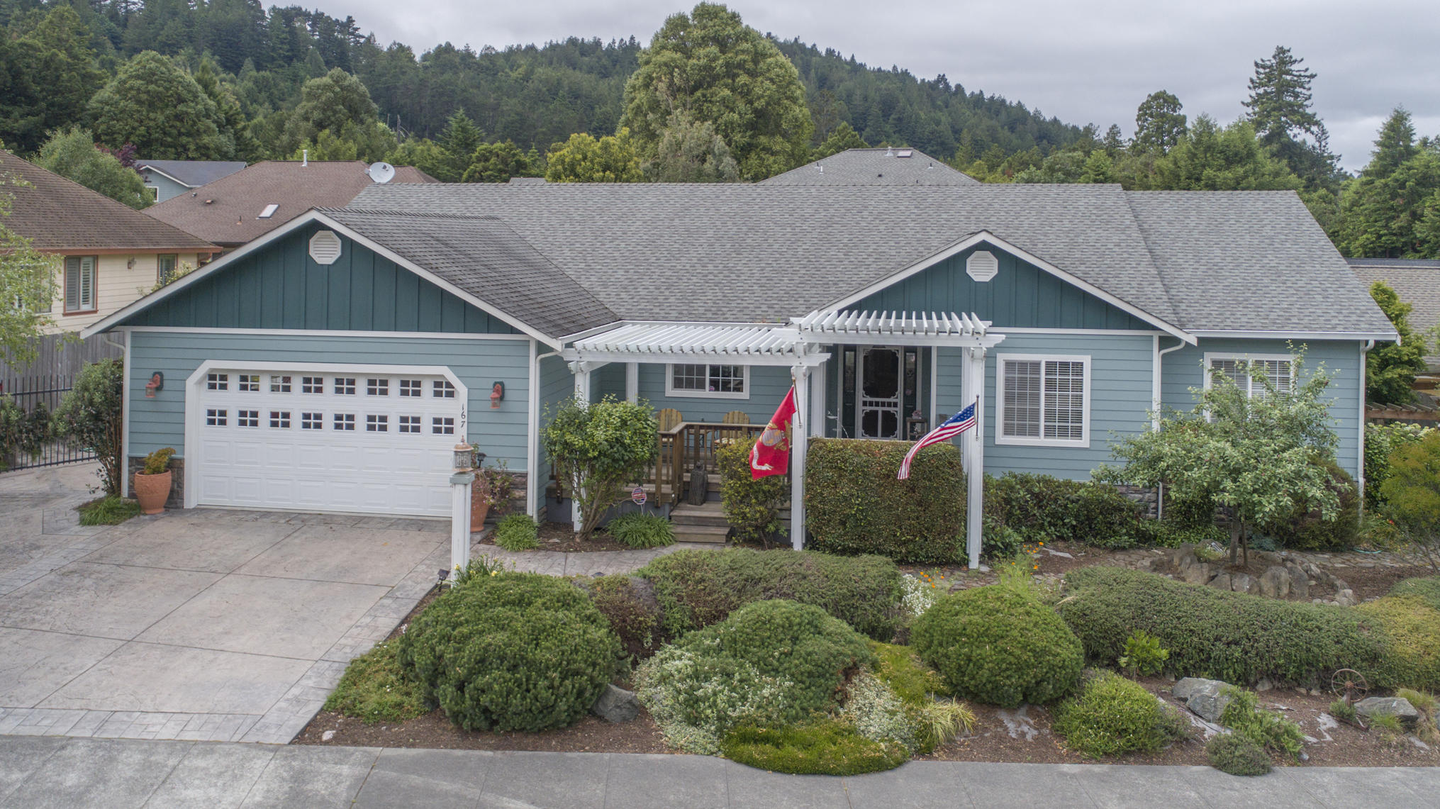 167 Grayland Heights Road Rio Dell, CA 95562 - Photo 1 of 1 a view of a house with a yard
