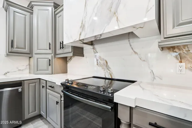 a bathroom with a sink a mirror and a shower