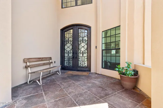 a view of a livingroom with a furniture and a gate