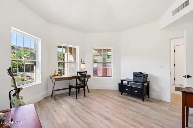 a swimming pool with outdoor seating yard and barbeque oven