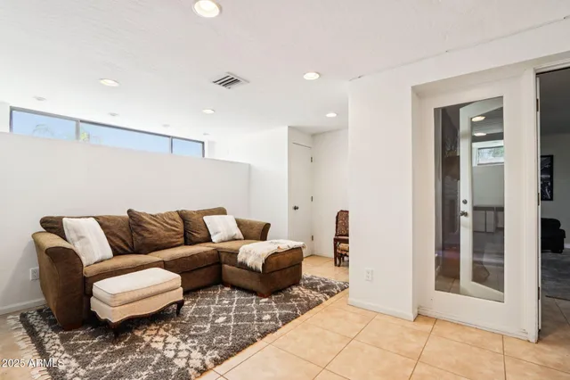 a view of a patio with swimming pool table and chairs