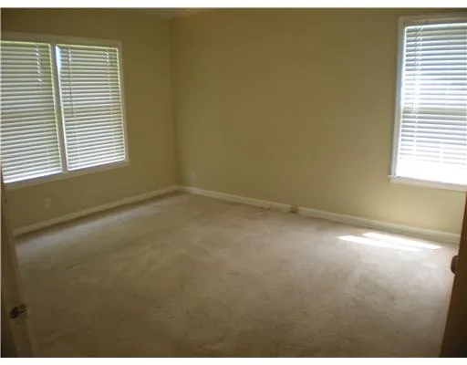 a view of a room that has a window in it