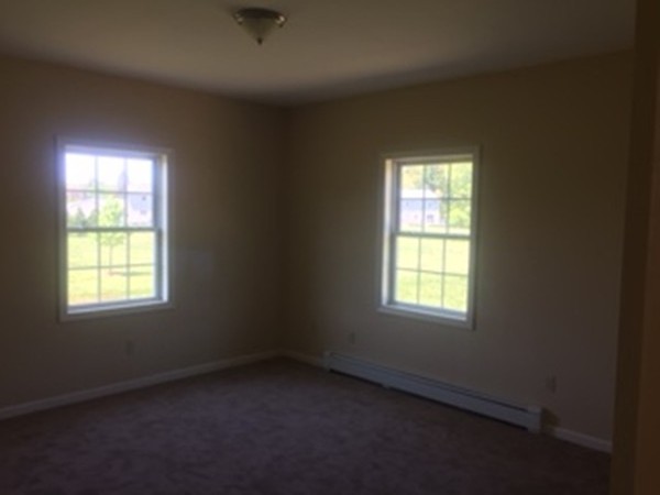 10 Gunn Road Montague, MA 01351 - Photo 16 of 26 an empty room with a window
