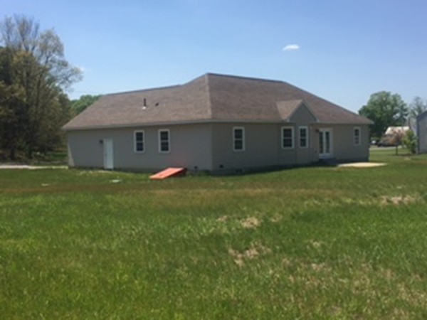 10 Gunn Road Montague, MA 01351 - Photo 5 of 26 a front view of house with yard and green space