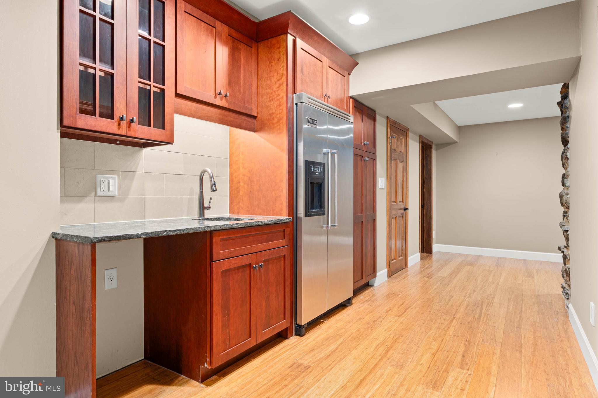 1311 Hagys Ford Road Penn Valley, PA 19072 - Photo 41 of 80 a kitchen with stainless steel appliances granite countertop a refrigerator and a sink