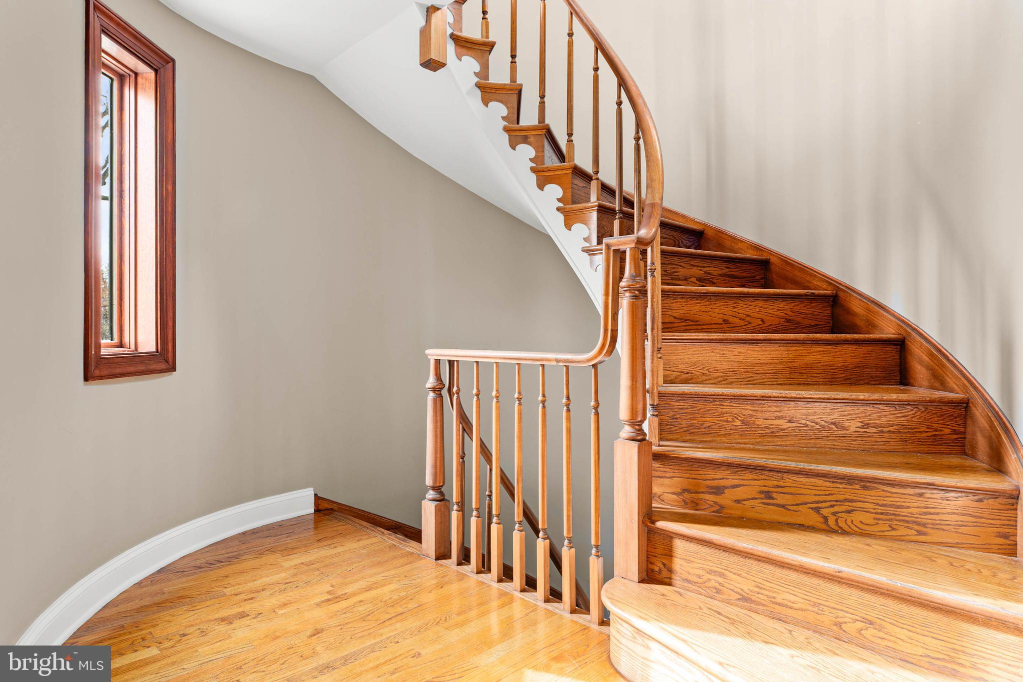 1311 Hagys Ford Road Penn Valley, PA 19072 - Photo 48 of 80 a view of staircase with wooden floor and a window