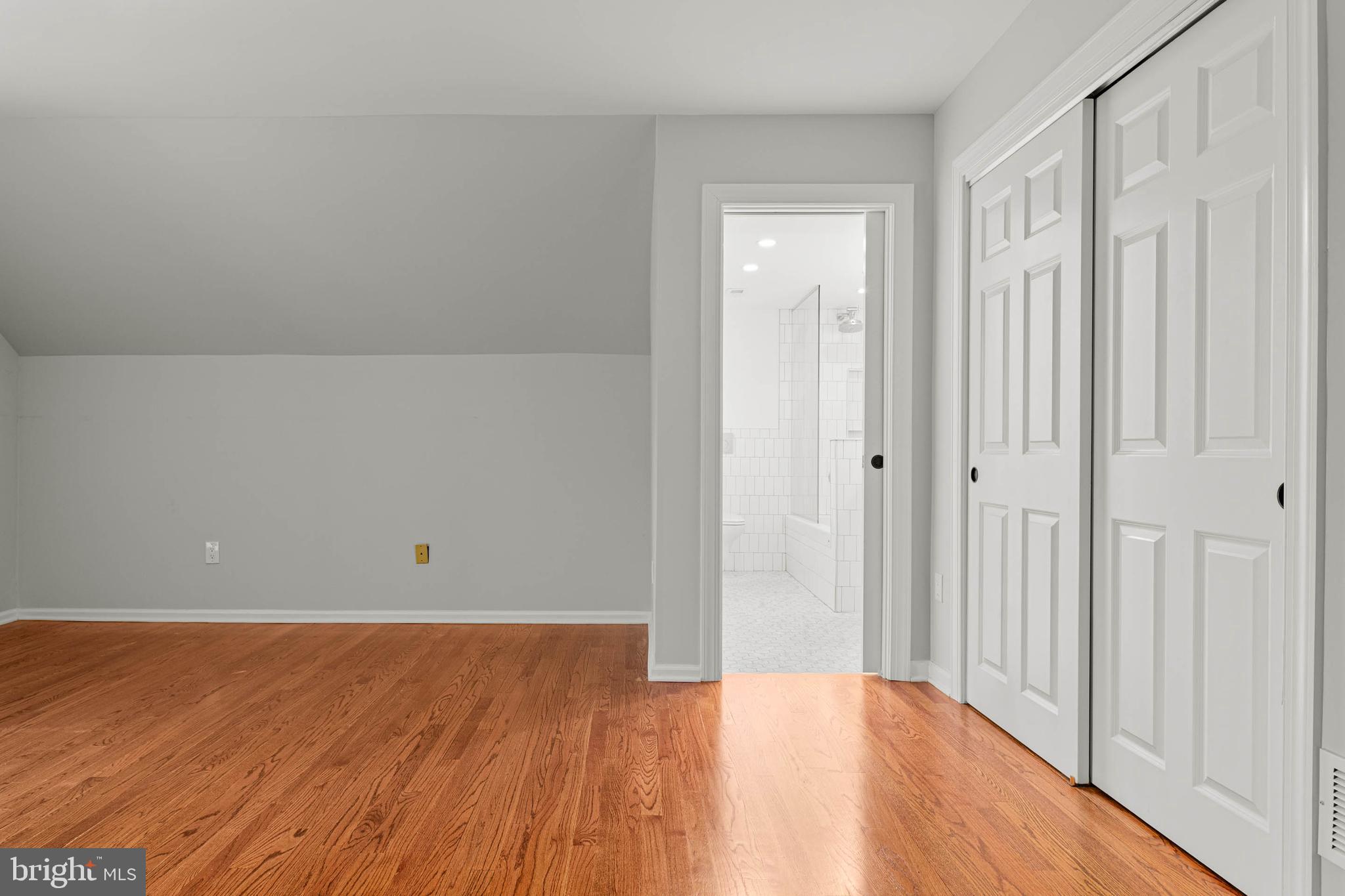 1311 Hagys Ford Road Penn Valley, PA 19072 - Photo 59 of 80 a view of an empty room with wooden floor