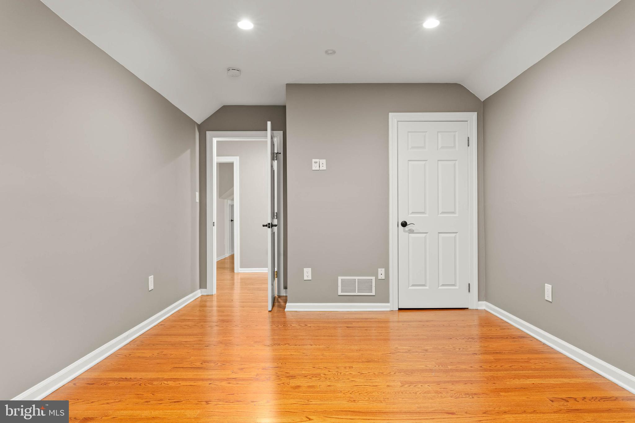 1311 Hagys Ford Road Penn Valley, PA 19072 - Photo 63 of 80 a view of an empty room with wooden floor