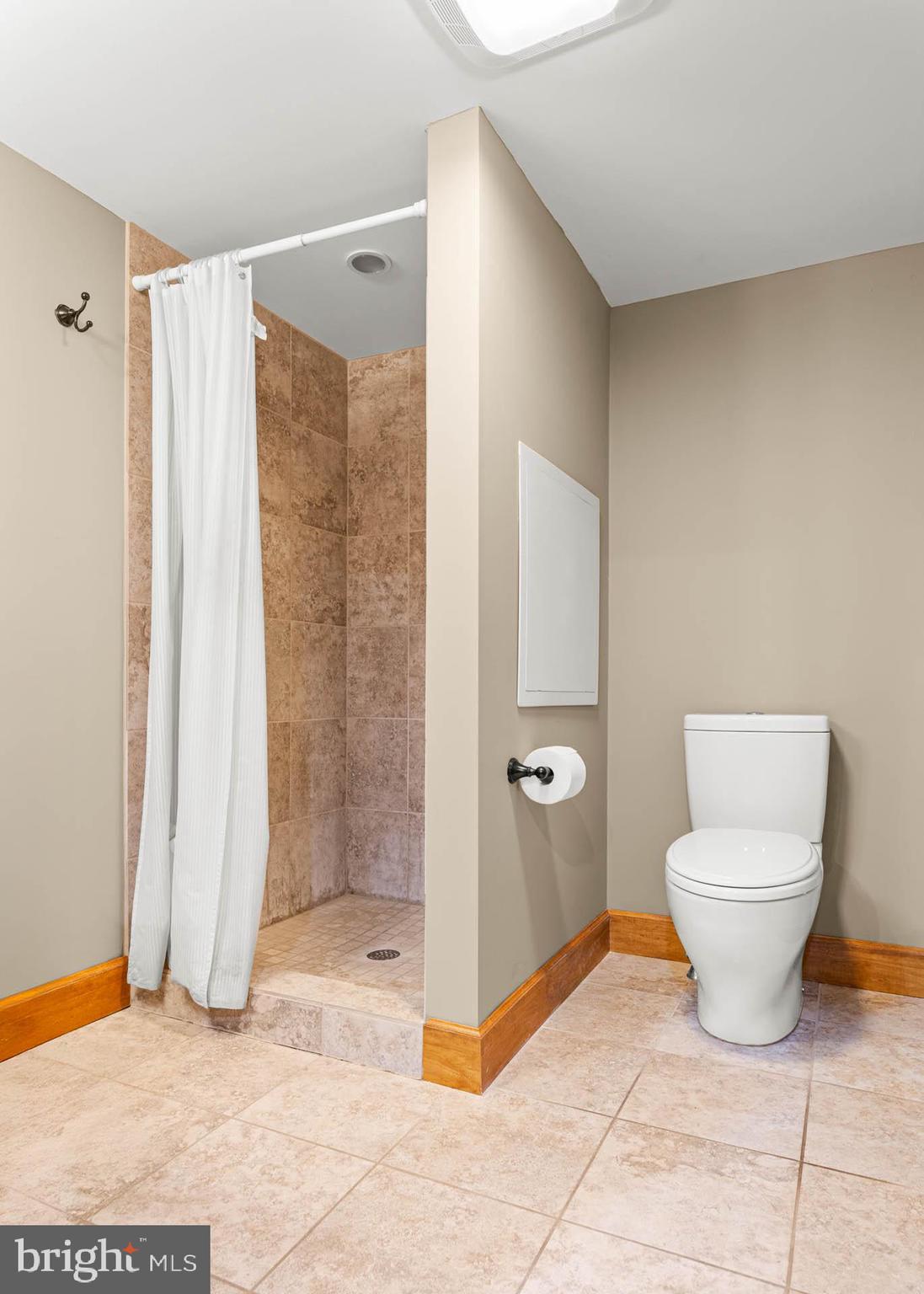 1311 Hagys Ford Road Penn Valley, PA 19072 - Photo 69 of 80 a bathroom with a toilet and a shower