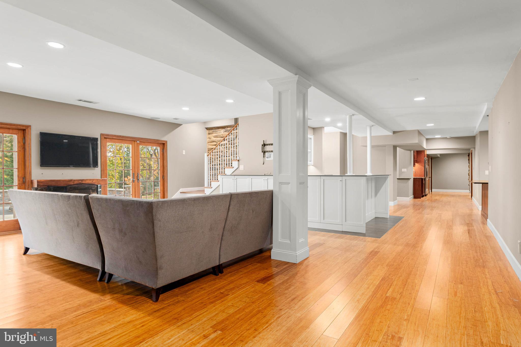 1311 Hagys Ford Road Penn Valley, PA 19072 - Photo 9 of 80 a living room with furniture and a flat screen tv