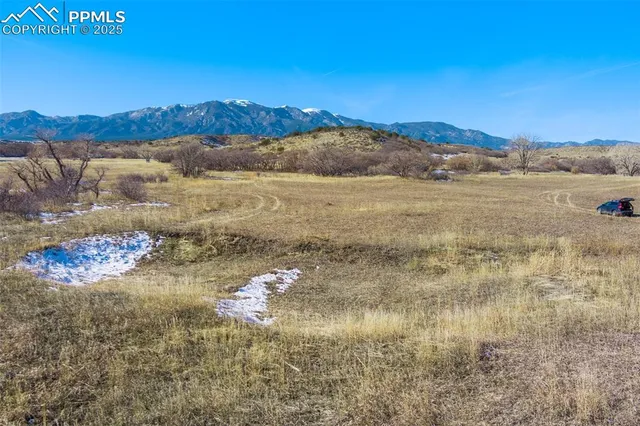 a view of lake with mountain