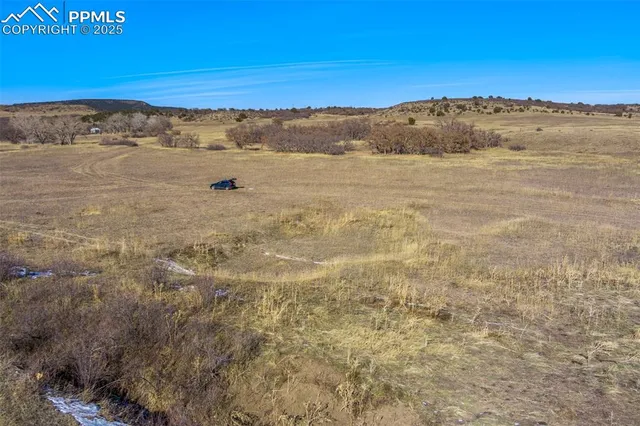 a view of beach and mountain