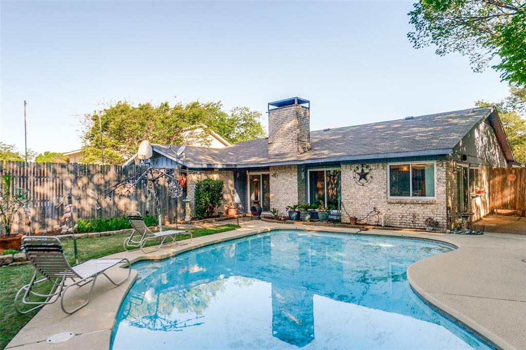 44 Merrie Circle Richardson, TX 75081 - Photo 24 of 30 a view of a house with swimming pool and sitting area
