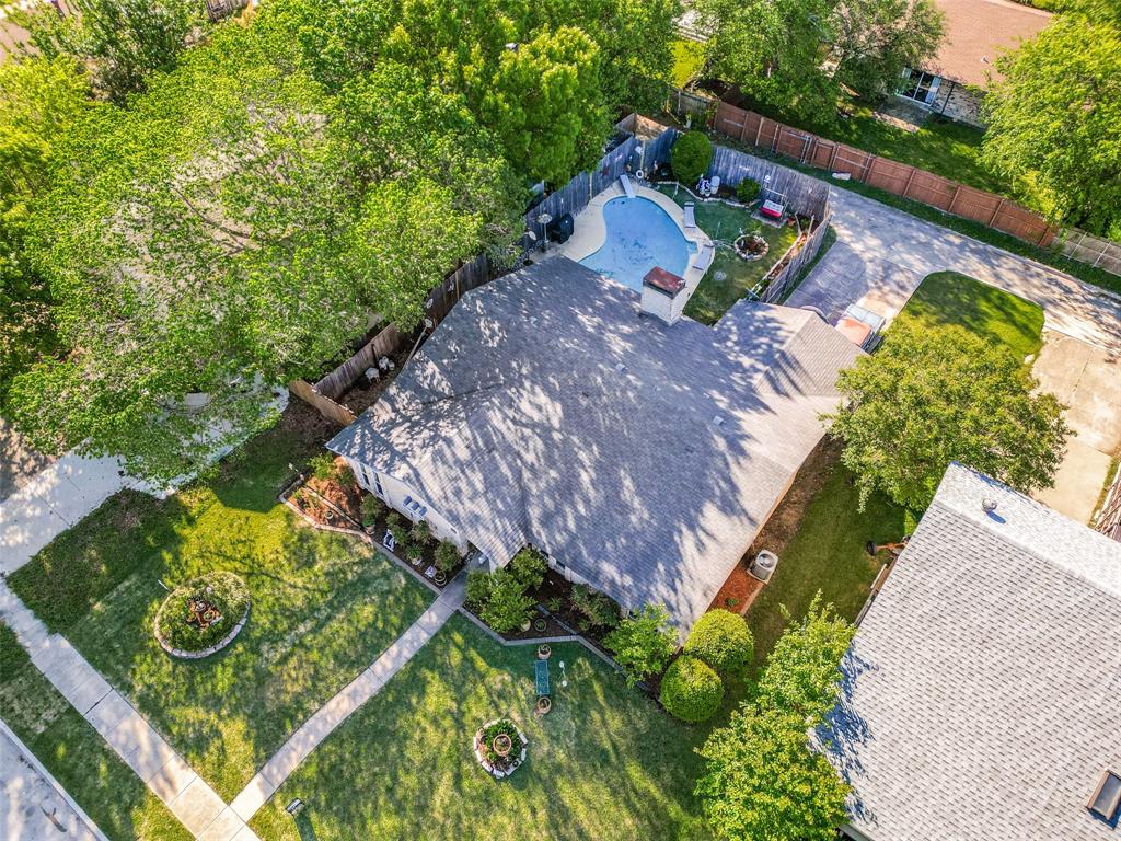 44 Merrie Circle Richardson, TX 75081 - Photo 27 of 30 a view of a yard with chairs