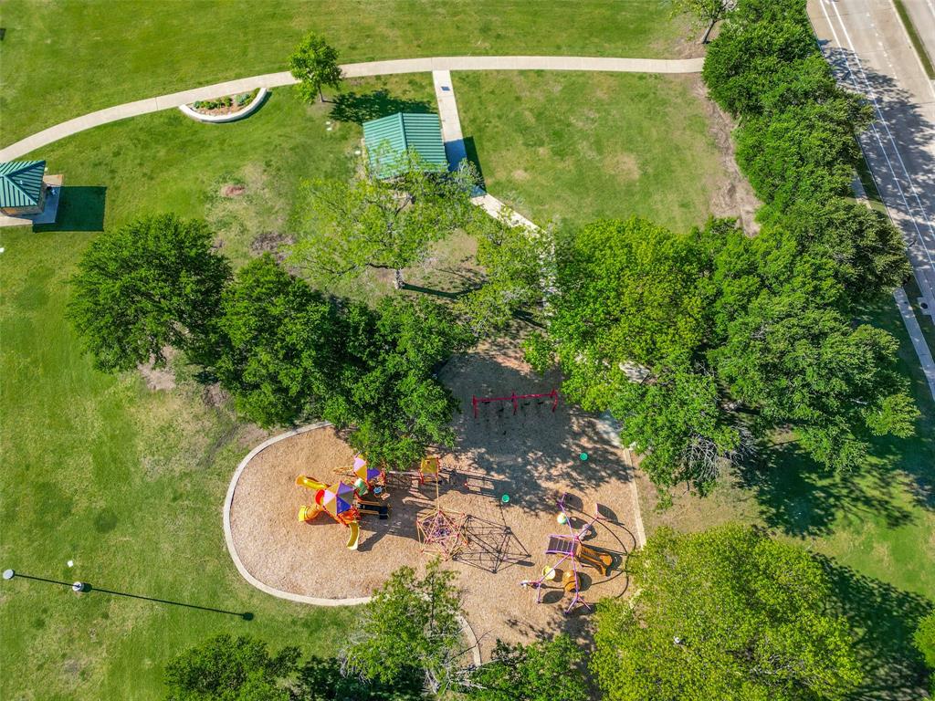 44 Merrie Circle Richardson, TX 75081 - Photo 30 of 30 an aerial view of a house with a yard and lake view